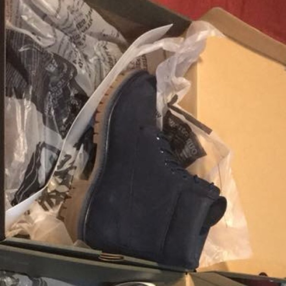 Two Pairs Of Timberlands